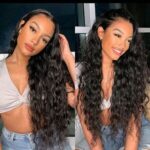 young lady put on a loose deep wave bundles with closure